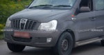 2011-Mahindra-Xylo-Micro-Hybrid-front-three-quarter-left-headlights-grille