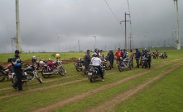 Monsoon Madness - Riders halt for capturing snaps at the top of wind mill farms in Chalkewadi