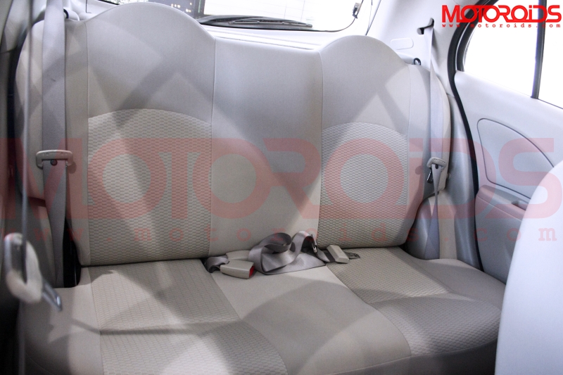 The rear bench can seat two adults and a kid with ease 2010 Nissan Micra K13 First drive review / road test / impressions - www.motoroids.com