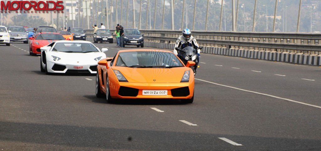 Gautam Singhania on the sea link in the lead car of the 4th Parx Super Car Show parade