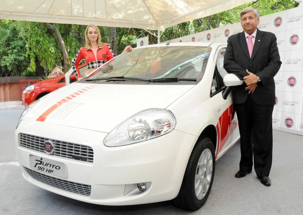 Mr.-Rajeev-Kapoor-with-the-Fiat-Grande-Punto-90HP-MULTIJET-1 FIAT Punto 90HP Diesel has been launched in India; prices, specification, details and extensive review on Motoroids.com