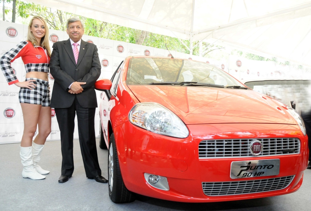 Mr.-Rajeev-Kapoor-with-the-Fiat-Grande-Punto-90HP-MULTIJET-2 FIAT Punto 90HP Diesel has been launched in India; prices, specification, details and extensive review on Motoroids.com