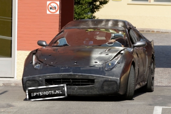 A mysterious looking Ferrari test mule has been spotted near the Ferrari factory in Maranello. Could be a 612 Scaglietti replacement of the 458 Italia Special Edition or a new model altogether! Photos & Video on Motoroids.com