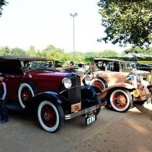 Vintage beauties on millenium city roads  gun salute vintage car rally
