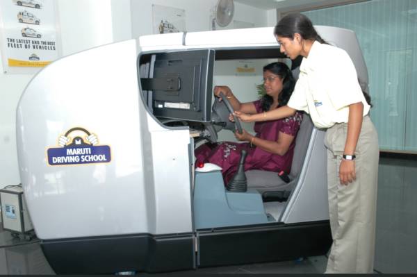 A woman getting training on safe driving practices at the Maruti Suzuki managed IDTR