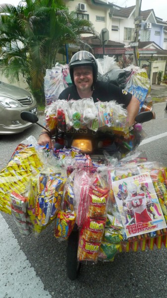 Charley Boorman on a roti bike before heading out on his challenge filming Freedom Riders Asia in Kuala Lumpur Malaysia