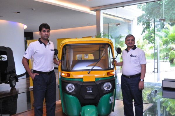 Mr. Rajiv Bajaj, MD and Mr. R C Maheshwari, President - CV Bajaj Auto Ltd. with the newly launched RE - Compact