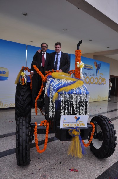 Mr. Rakesh Malhotra, Head of New Holland Fiat India,Mr Stefano Pampalone, Head of Operations for India, Pakistan, Far East and Japan at the Celebration to mark rollout of New Holland's 2,50,000th tractor3