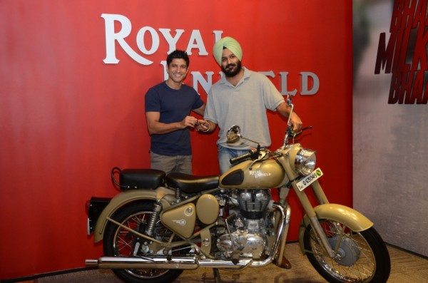 Farhan Akhtar giving away the Royal Enfield Desert Storm to Hamininder Singh