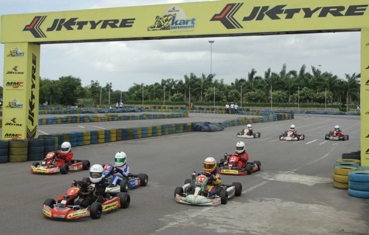 Karters race at Round  of the th JK Tyre FMSCI National Rotax Max Karting Championship at JK Tyre MMS Kartainment Track in Hyderabad