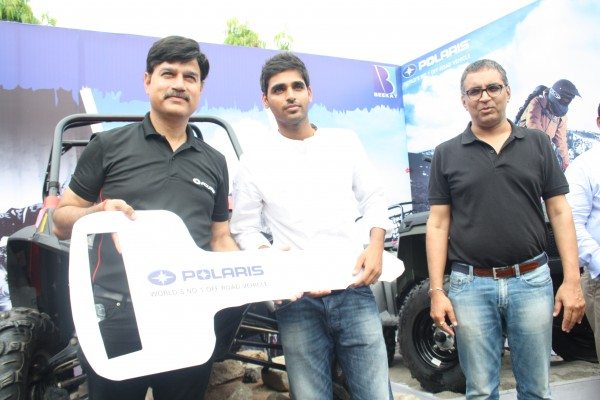 Mr Pankaj Dubey - MD Polaris India Handing over the keys of RZR S 800 to Cricketer Bhuvenshwar Kumar along with Bhavnish Mediratta (Beekay Motors - MD)