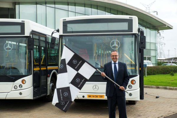 Mr. Eberhard Kern,MD and CEO, Mercedes-Benz India flags off the city buses for employees from the Chakan Plant today