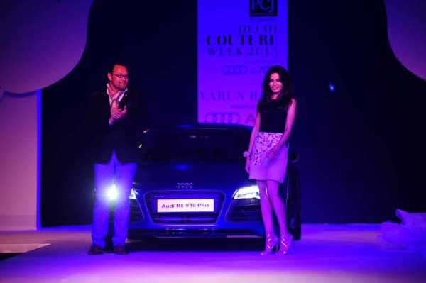 Audi India Head Mr  Michael Perschke and global Indian actress Freida Pinto posing with New Audi R8 V10 Plus at Audi Autumn Collection 2014 Showcase du