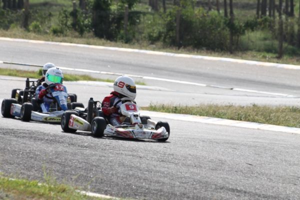 Pradyumn Danigund leads Yash Aradhya in Micro Max Heats of the JK Tyre-FMSCI National Rotax Max Karting Championship 2013 Round 3 in Coimbatore on Saturday