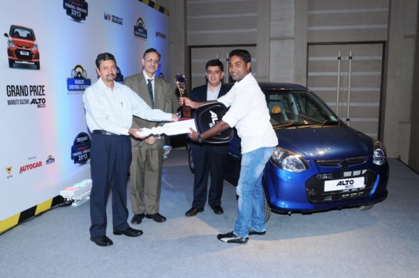 (L-R). Manohar Bhatt, Vice President, Marketing, Maruti Suzuki India,Mahesh Rajoria-Director,IDTR,Hormazd Sorabjee, Editor, Autocar India with winner Mr. Smruti Ranjan Das