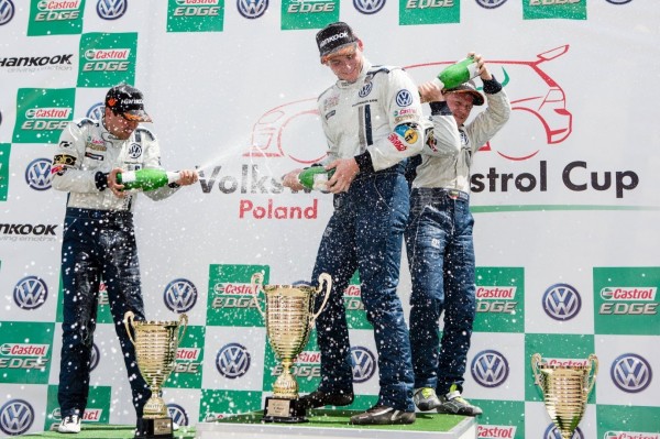 Picture 1- (L-R) - Volkswagen Castrol Cup Round 3 Race 2 top three finishers Marcus Fluch, Jeffery Kruger and Robertas Kupcikas celebrating on the podium