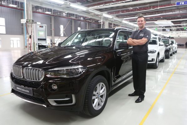 Robert Frittrang Managing Director BMW Plant Chennai with the all new BMW X as it rolls out of BMW Plant Chennai