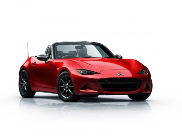 All new  Mazda MX  Miata drops its top