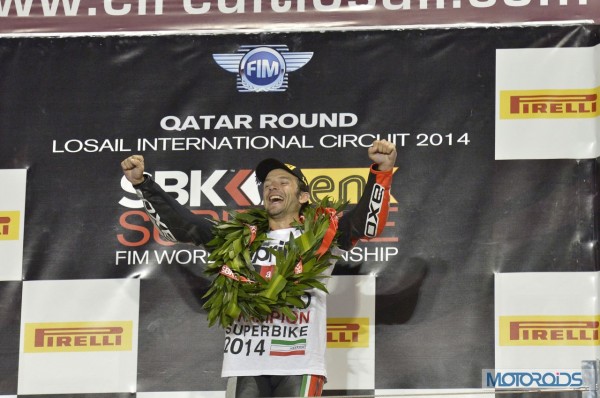 Guintoli-Wins-WSBK-2014-Stands-At-Podium (1)