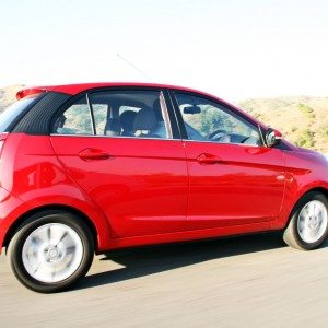 Tata Bolt red action side