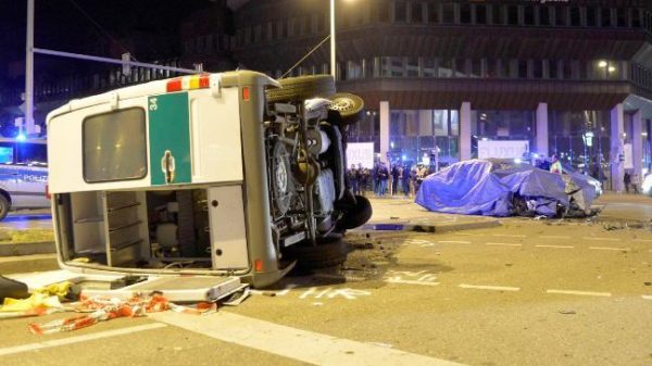 BMW collides with police van