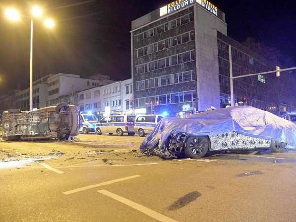 BMW crashes into police van
