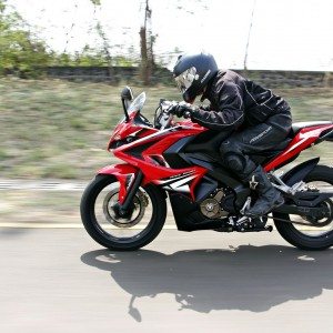 Bajaj Pulsar RS riding left side