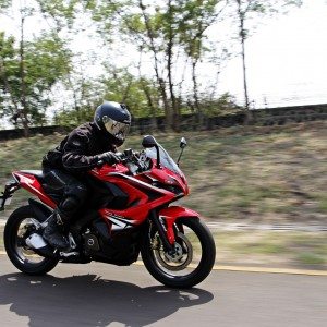 Bajaj Pulsar RS riding left side