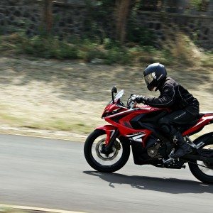 Bajaj Pulsar RS riding left side