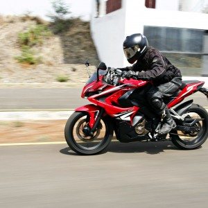 Bajaj Pulsar RS riding left side