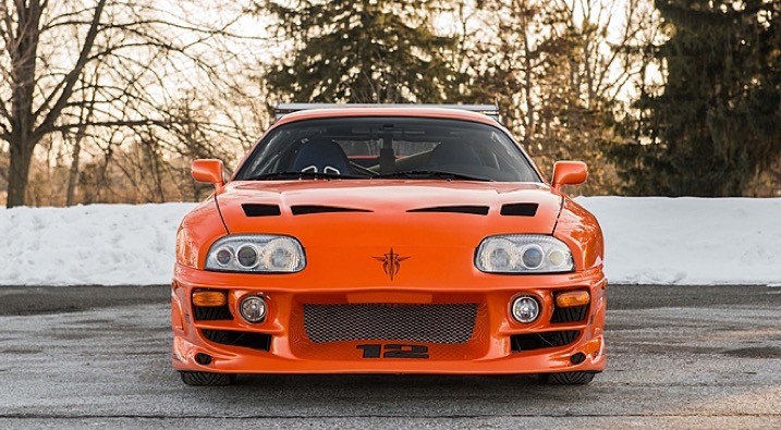 Jada 1995 Toyota Supra Orange W/Lights & Brian Figure Fast