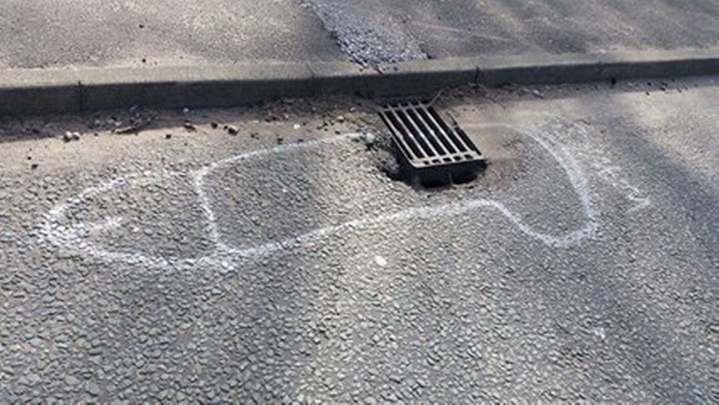 wanksy artist pothole graffiti (3)