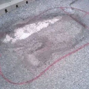 wanksy artist pothole graffiti