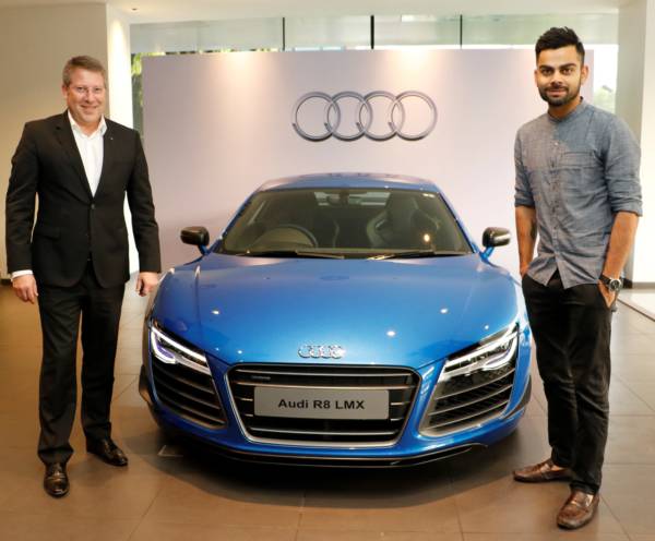 Joe King, Head Audi India delivers the limited edition Audi R8 LMX to Ace Cricketer virat Kohli 1