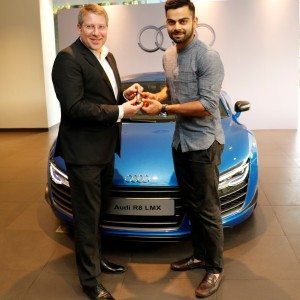 Joe King Head Audi India delivers the limited edition Audi R LMX to Ace Cricketer virat Kohli