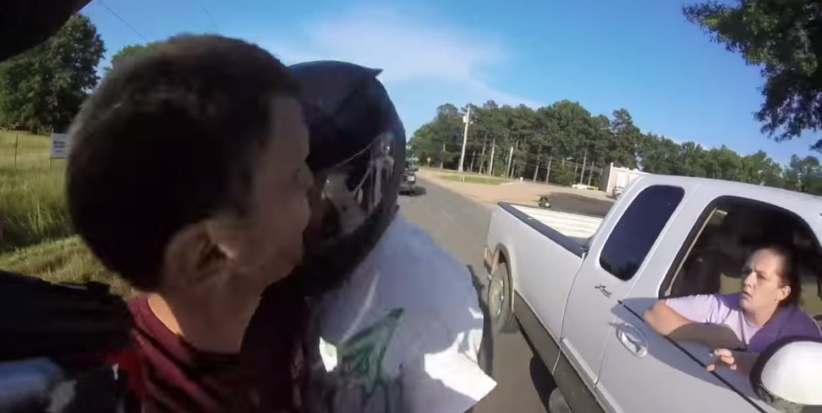 Motorcyclist headbutts SUV driver