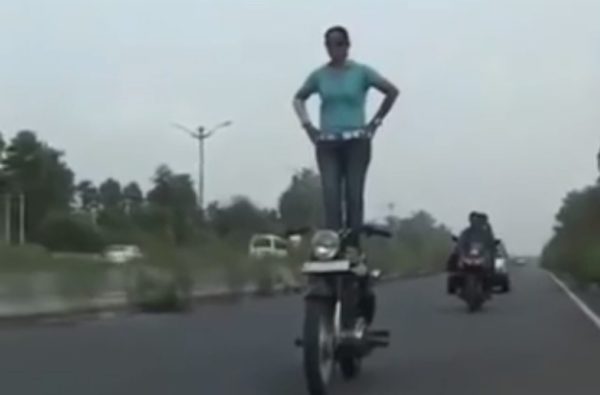woman stunting on an enfield1