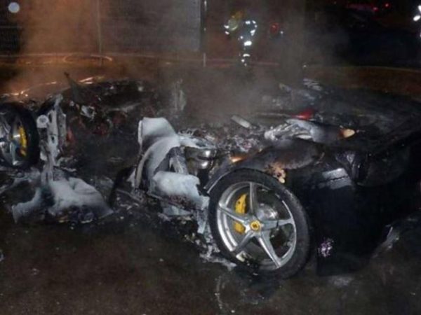 year old burns Ferrari