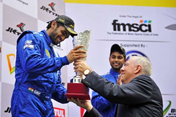 Sailesh Bolisetti taking trophy from Dr. Lauermann after winning the last race of Vento Cup 2015