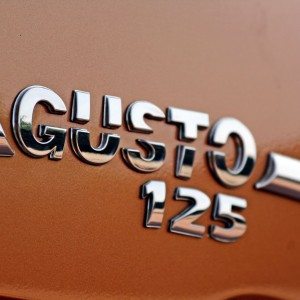 Mahindra Gusto  Review Details Chrome Badge