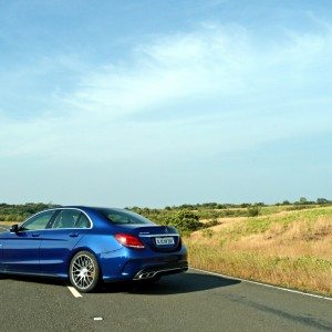 Mercedes AMG C  S open road backdrop