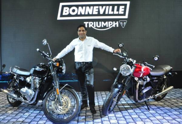Vimal Sumbly Managing Director Triumph Motorcycles India alongside the new Bonneville T  and the Street Twin