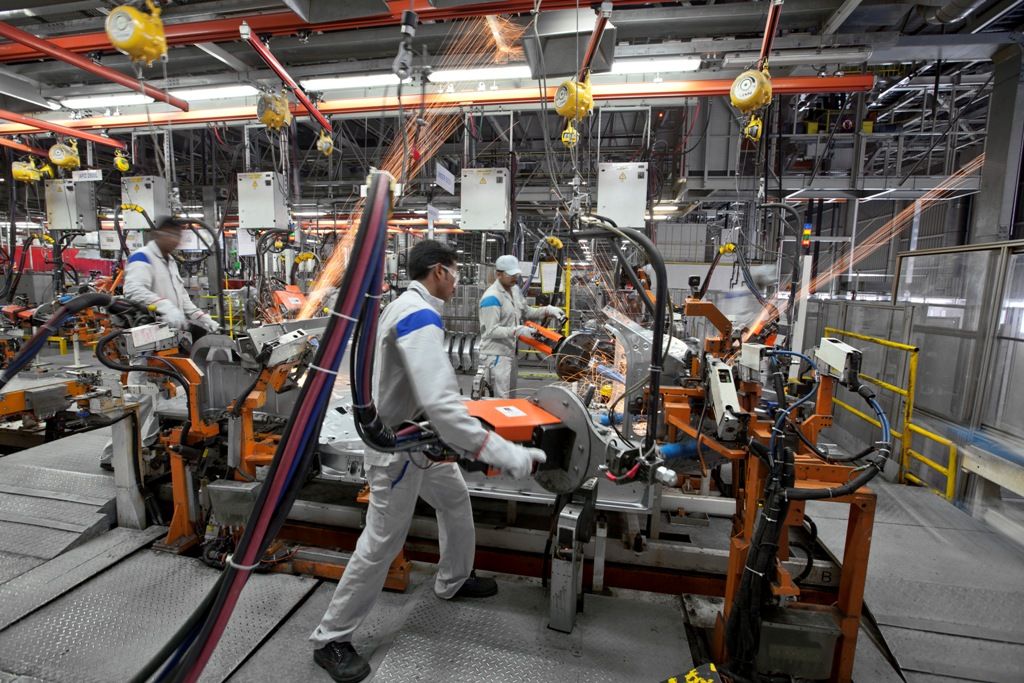 Employees at Volkswagen Pune Plant