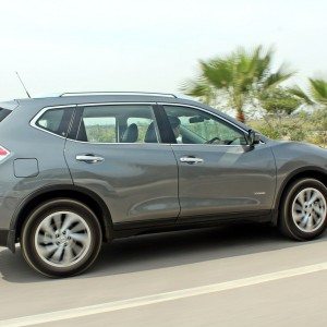 new  Nissan X Trail Hybrid India grey action