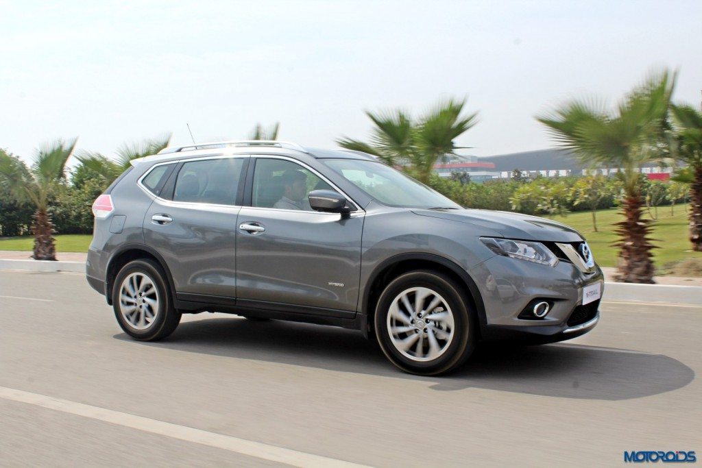 new 2016 Nissan X-Trail Hybrid India grey action (4)