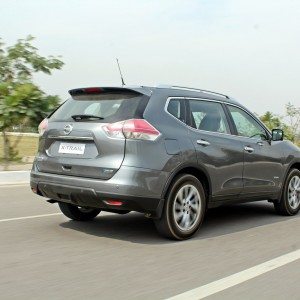 new  Nissan X Trail Hybrid India grey action rear
