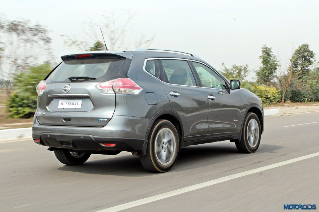 new 2016 Nissan X-Trail Hybrid India grey action rear (3)