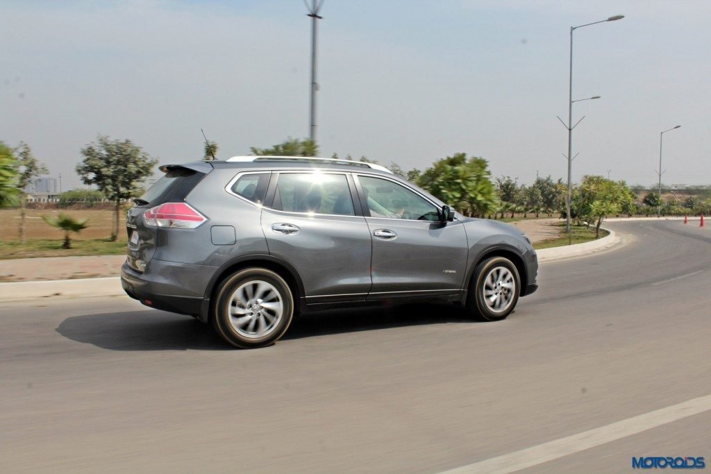 new 2016 Nissan X-Trail Hybrid India grey action rear (4)