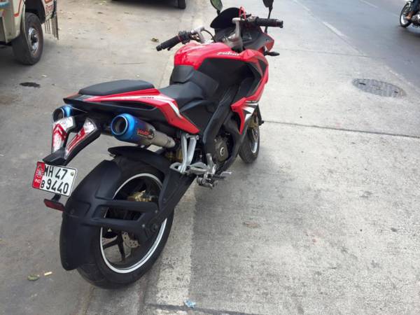 Bajaj Pulsar RS with a dual under seat exhaust system Marks Performance Racing Exhausts