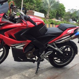 Bajaj Pulsar RS with a dual under seat exhaust system Marks Performance Racing Exhausts